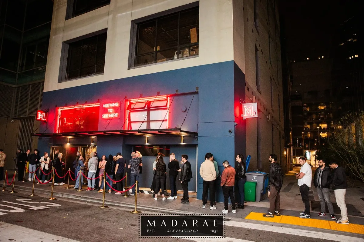 Madarae exterior with guests lined up on Minna Street