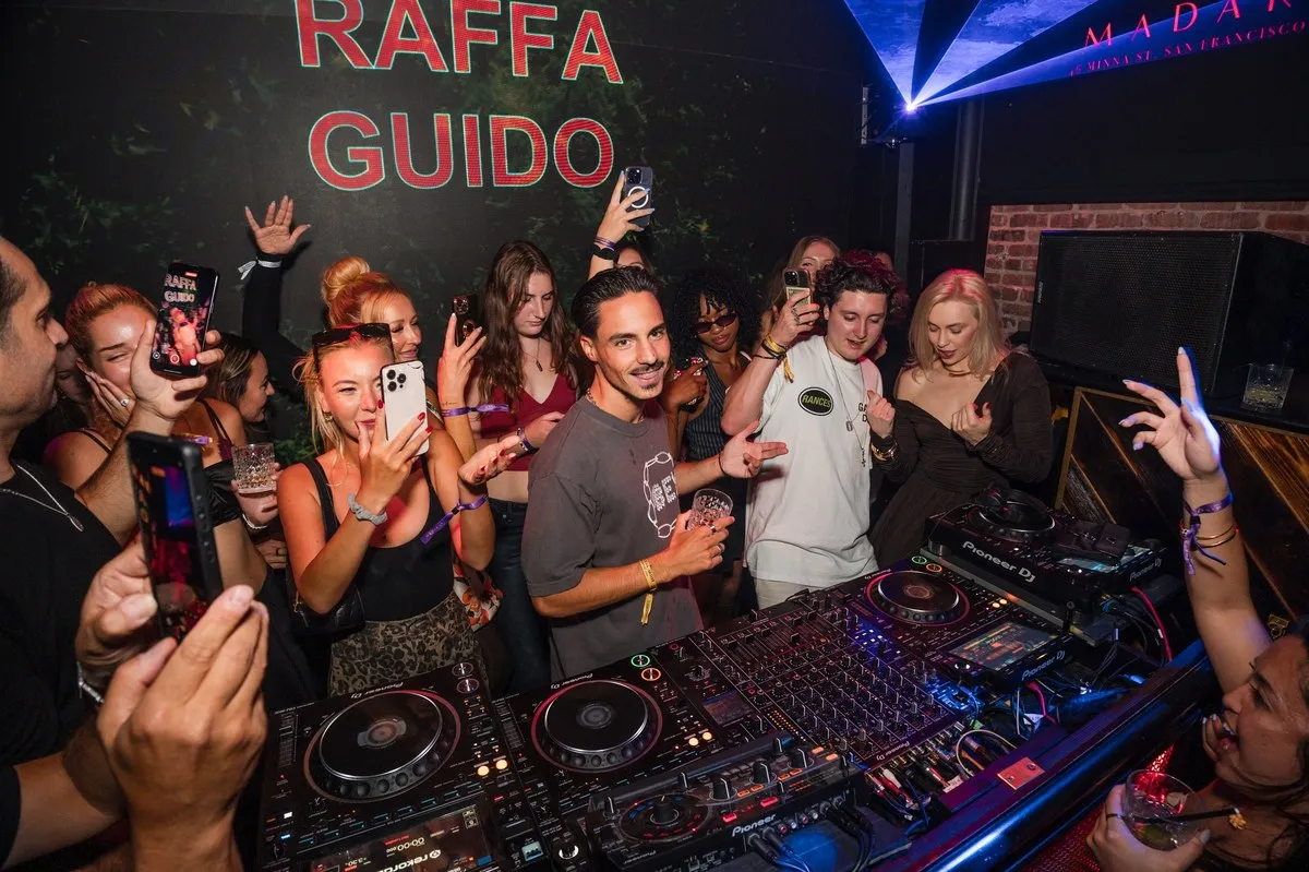 Raffa Guido DJing with the crowd behind