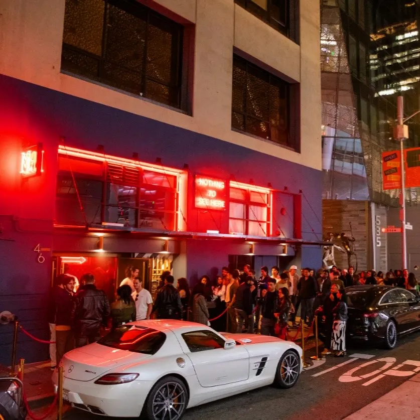 Line of guests outside Madarae at night